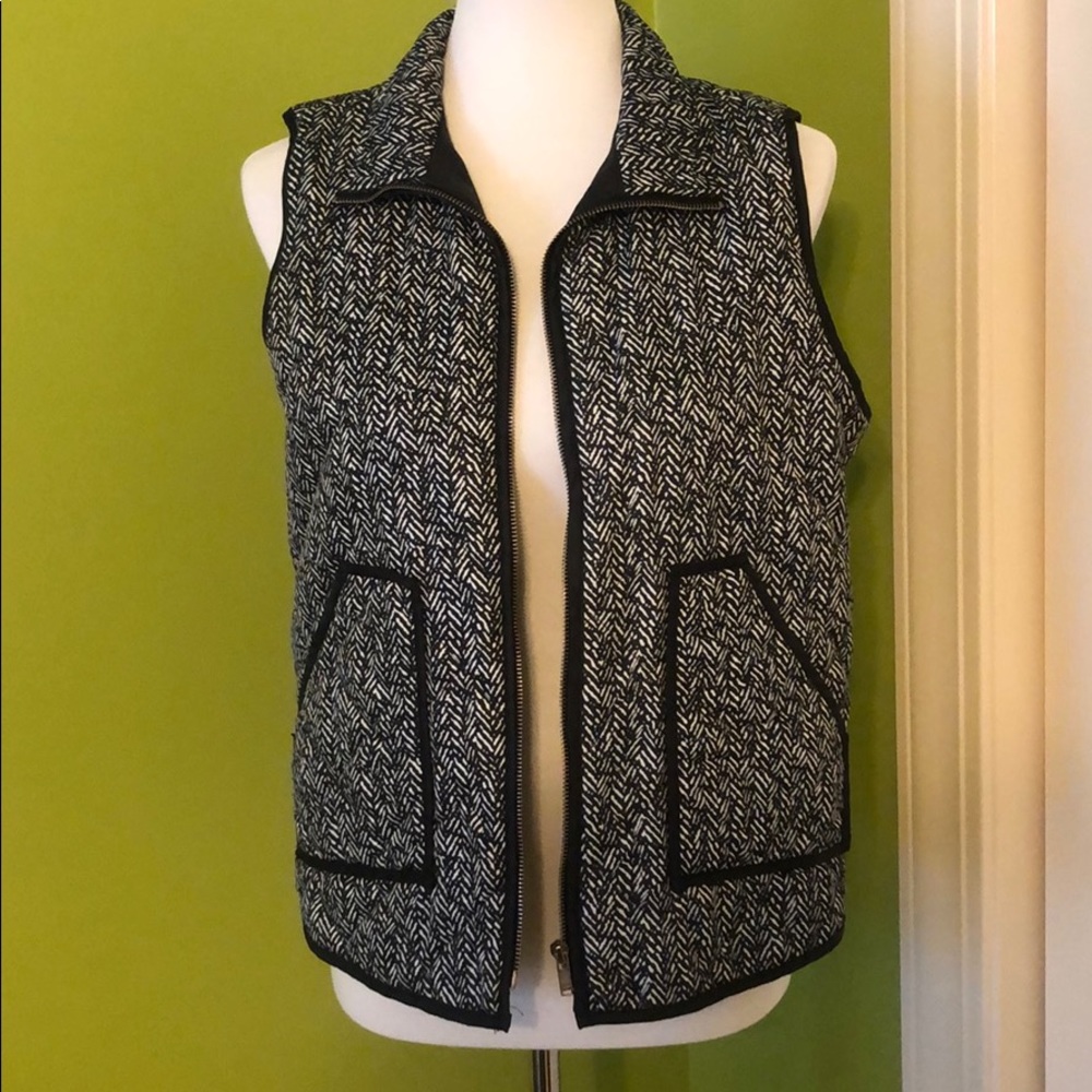 Large Wanna B black & white vest. Great condition.